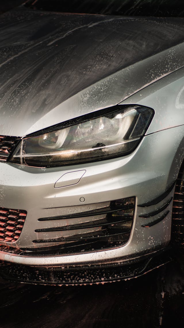 Front detail of a wet vehicle