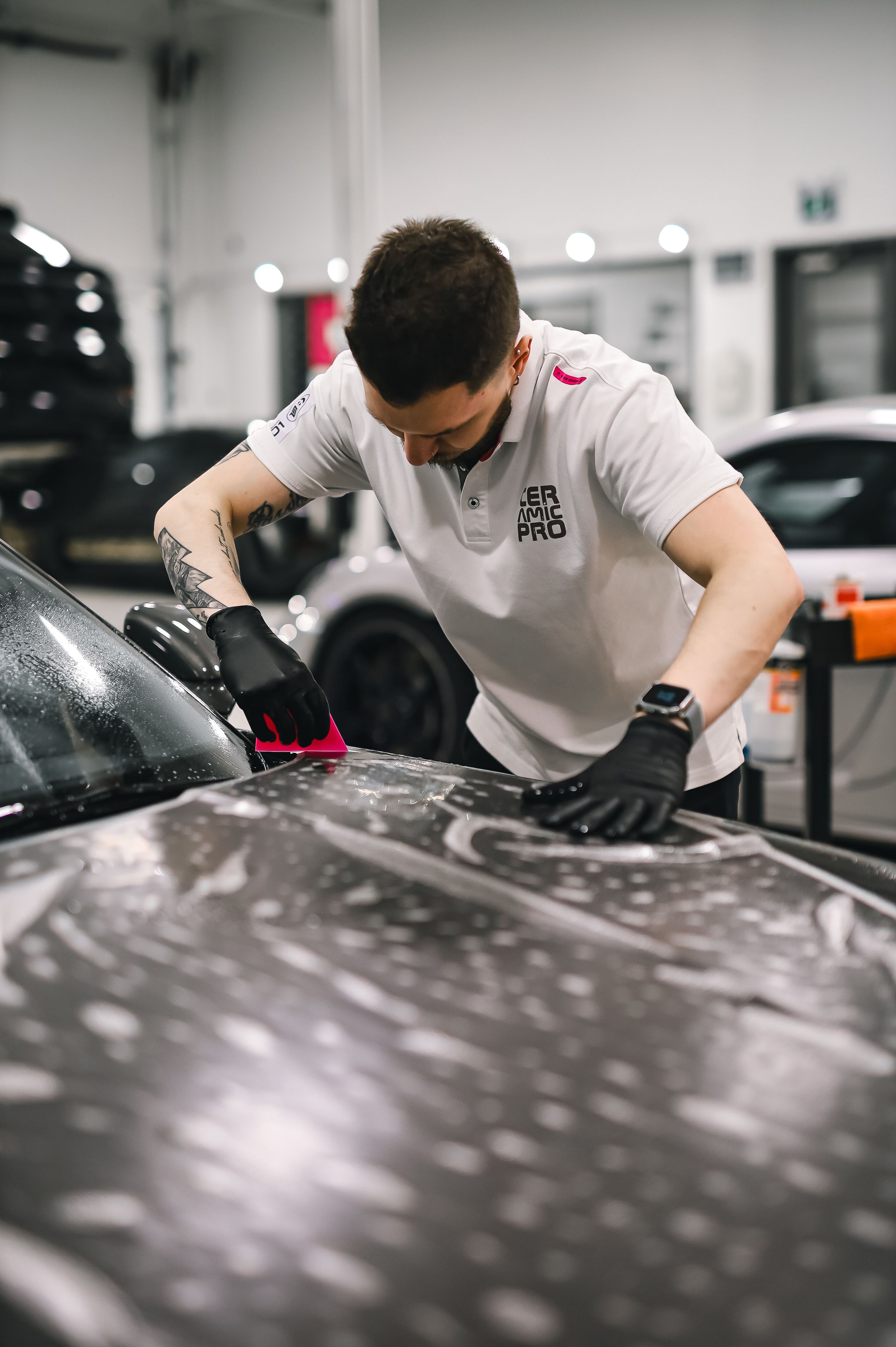 Paint film preparation on a detailed hood